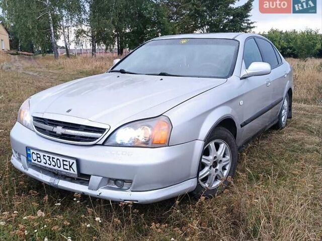 Серый Шевроле Эванда, объемом двигателя 2 л и пробегом 200 тыс. км за 3200 $, фото 1 на Automoto.ua