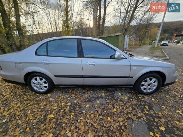 Серый Шевроле Эванда, объемом двигателя 2 л и пробегом 314 тыс. км за 3900 $, фото 9 на Automoto.ua