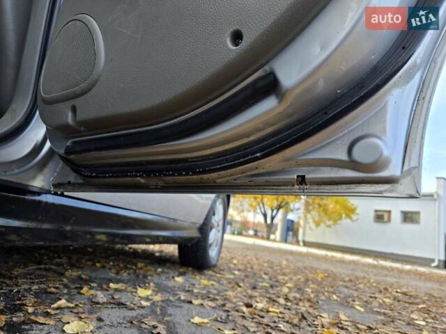 Серый Шевроле Эванда, объемом двигателя 2 л и пробегом 314 тыс. км за 3900 $, фото 12 на Automoto.ua