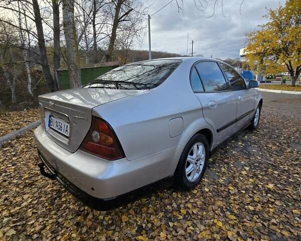 Серый Шевроле Эванда, объемом двигателя 2 л и пробегом 314 тыс. км за 3900 $, фото 8 на Automoto.ua