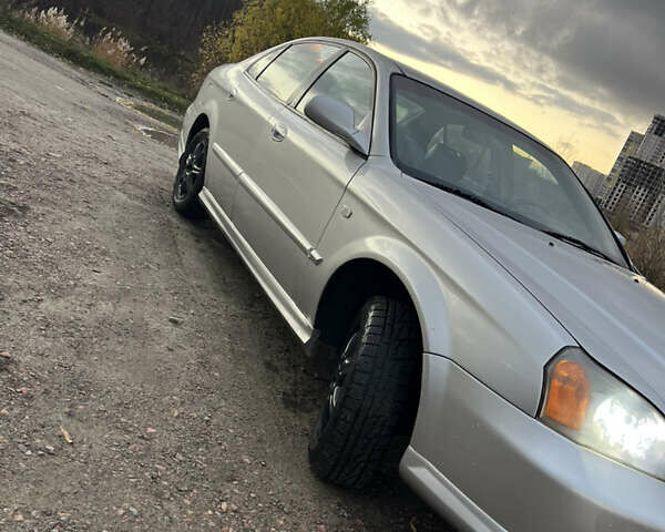 Серый Шевроле Эванда, объемом двигателя 2 л и пробегом 260 тыс. км за 3799 $, фото 1 на Automoto.ua