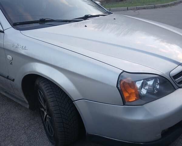 Сірий Шевроле Еванда, об'ємом двигуна 2 л та пробігом 198 тис. км за 3900 $, фото 3 на Automoto.ua