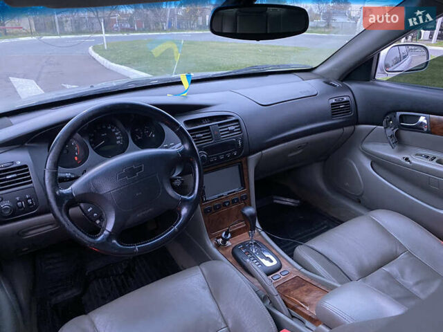 Серый Шевроле Эванда, объемом двигателя 2 л и пробегом 210 тыс. км за 3300 $, фото 10 на Automoto.ua