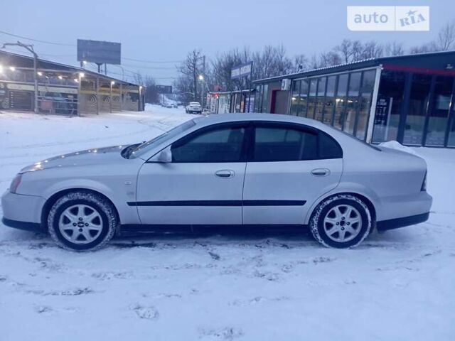 Сірий Шевроле Еванда, об'ємом двигуна 2.49 л та пробігом 220 тис. км за 3400 $, фото 5 на Automoto.ua