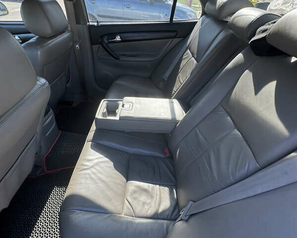 Серый Шевроле Эванда, объемом двигателя 2 л и пробегом 350 тыс. км за 3111 $, фото 8 на Automoto.ua