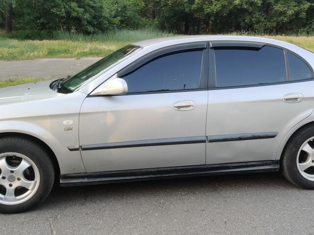 Сірий Шевроле Еванда, об'ємом двигуна 2 л та пробігом 219 тис. км за 3999 $, фото 1 на Automoto.ua