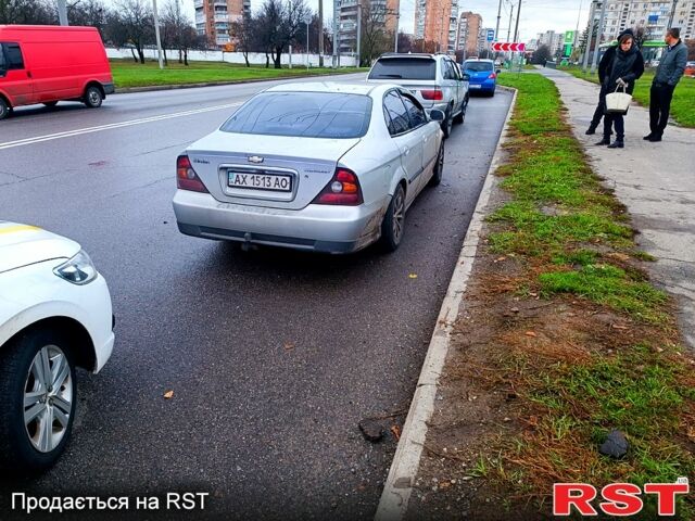 Серый Шевроле Эванда, объемом двигателя 2 л и пробегом 220 тыс. км за 1200 $, фото 4 на Automoto.ua