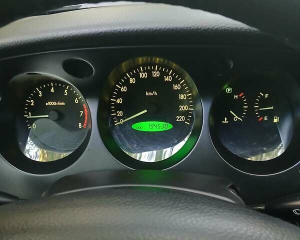 Серый Шевроле Эванда, объемом двигателя 2 л и пробегом 197 тыс. км за 3900 $, фото 1 на Automoto.ua