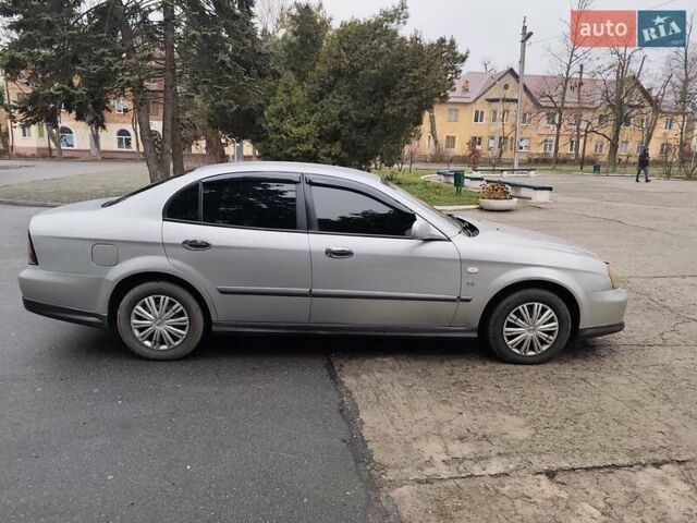 Серый Шевроле Эванда, объемом двигателя 2 л и пробегом 256 тыс. км за 4500 $, фото 6 на Automoto.ua