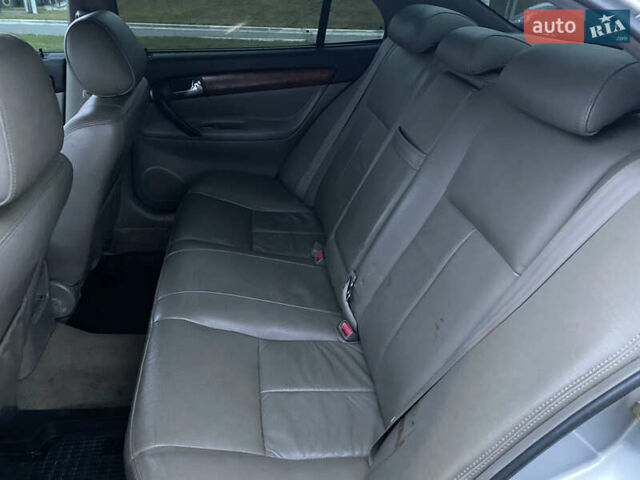 Серый Шевроле Эванда, объемом двигателя 2 л и пробегом 210 тыс. км за 3300 $, фото 8 на Automoto.ua