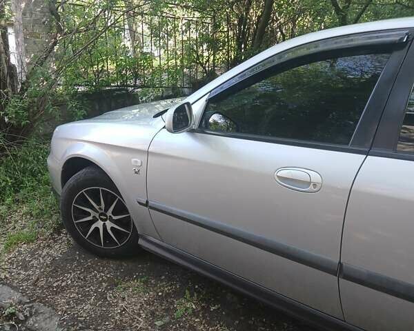 Серый Шевроле Эванда, объемом двигателя 2 л и пробегом 197 тыс. км за 3900 $, фото 14 на Automoto.ua