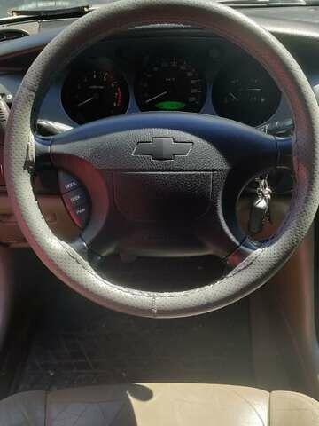 Сірий Шевроле Еванда, об'ємом двигуна 2 л та пробігом 219 тис. км за 3699 $, фото 15 на Automoto.ua