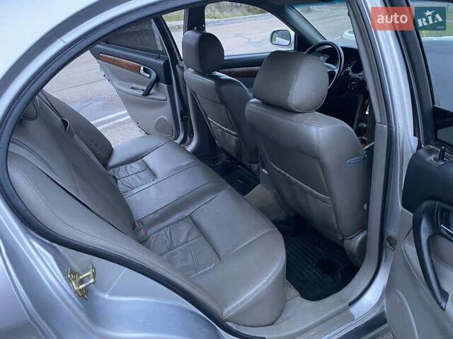 Серый Шевроле Эванда, объемом двигателя 2 л и пробегом 210 тыс. км за 3300 $, фото 7 на Automoto.ua