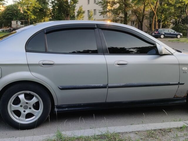 Сірий Шевроле Еванда, об'ємом двигуна 2 л та пробігом 219 тис. км за 3999 $, фото 4 на Automoto.ua