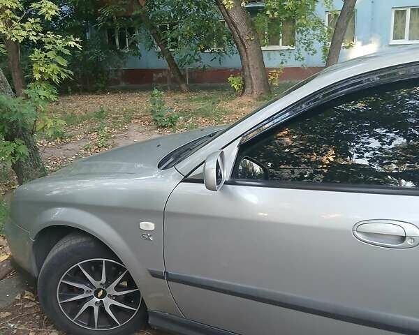 Серый Шевроле Эванда, объемом двигателя 2 л и пробегом 197 тыс. км за 3900 $, фото 13 на Automoto.ua