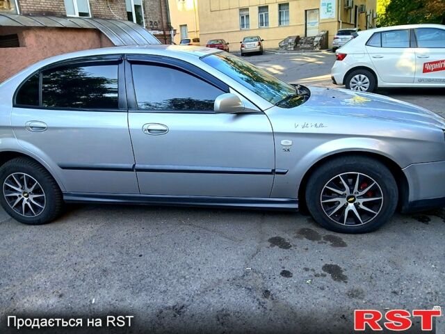 Сірий Шевроле Еванда, об'ємом двигуна 2 л та пробігом 198 тис. км за 3900 $, фото 1 на Automoto.ua