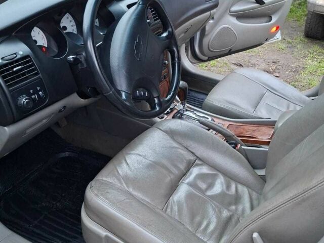 Серый Шевроле Эванда, объемом двигателя 2 л и пробегом 200 тыс. км за 2700 $, фото 7 на Automoto.ua