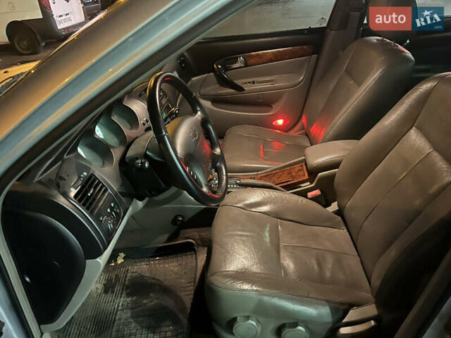 Серый Шевроле Эванда, объемом двигателя 2.5 л и пробегом 200 тыс. км за 2600 $, фото 9 на Automoto.ua