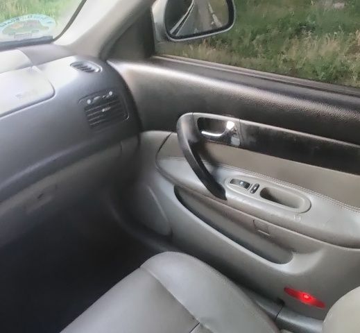 Сірий Шевроле Еванда, об'ємом двигуна 2 л та пробігом 219 тис. км за 3999 $, фото 19 на Automoto.ua