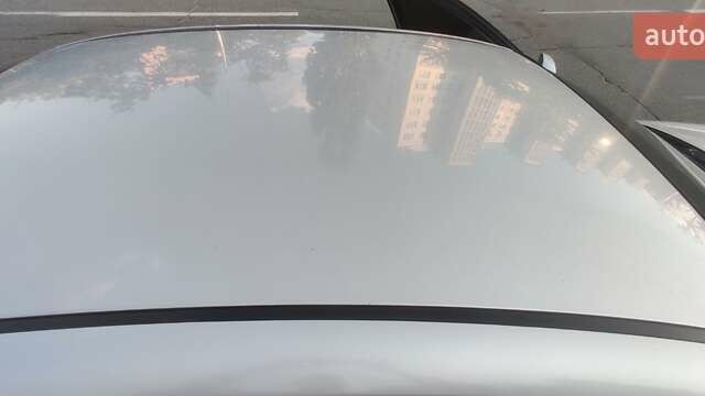 Сірий Шевроле Еванда, об'ємом двигуна 2 л та пробігом 219 тис. км за 3699 $, фото 6 на Automoto.ua