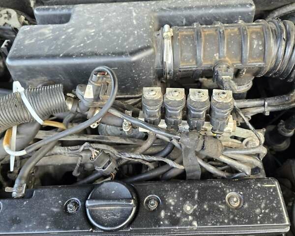 Серый Шевроле Эванда, объемом двигателя 2 л и пробегом 314 тыс. км за 3900 $, фото 16 на Automoto.ua