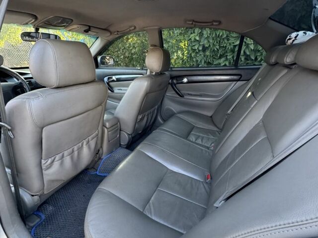 Серый Шевроле Эванда, объемом двигателя 2 л и пробегом 209 тыс. км за 3200 $, фото 4 на Automoto.ua