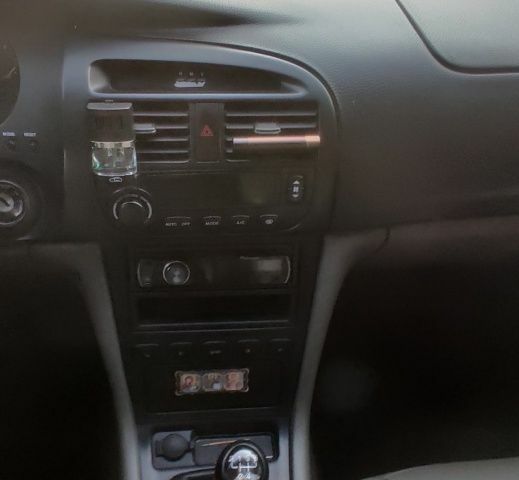 Сірий Шевроле Еванда, об'ємом двигуна 2 л та пробігом 219 тис. км за 3999 $, фото 21 на Automoto.ua