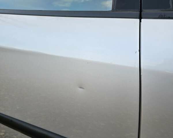 Серый Шевроле Эванда, объемом двигателя 2 л и пробегом 314 тыс. км за 3900 $, фото 25 на Automoto.ua