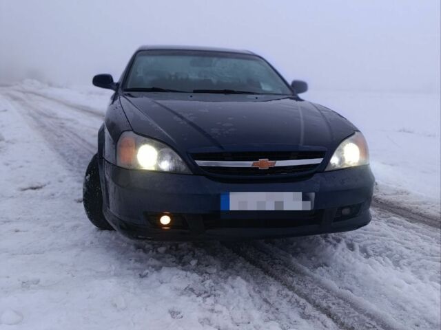 Синій Шевроле Еванда, об'ємом двигуна 2 л та пробігом 324 тис. км за 3000 $, фото 1 на Automoto.ua