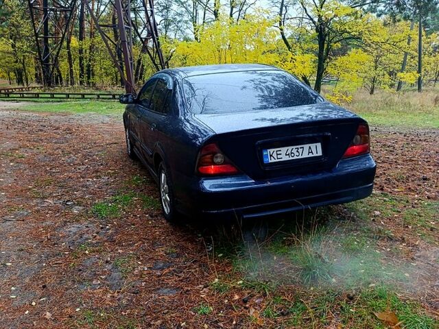 Синий Шевроле Эванда, объемом двигателя 2 л и пробегом 192 тыс. км за 4200 $, фото 2 на Automoto.ua