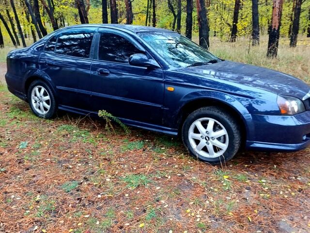 Синий Шевроле Эванда, объемом двигателя 2 л и пробегом 192 тыс. км за 4200 $, фото 3 на Automoto.ua