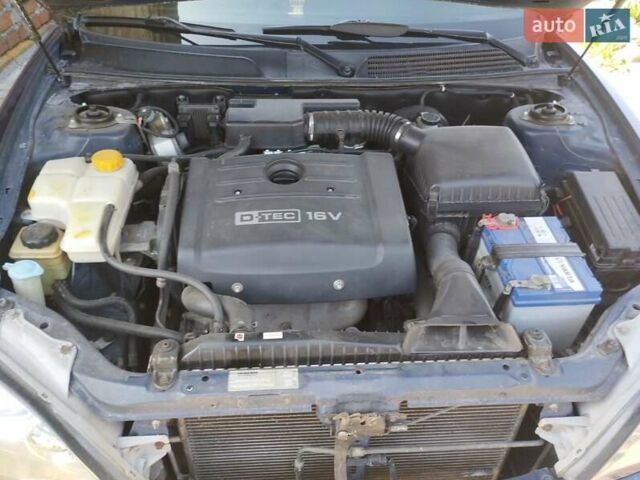 Синий Шевроле Эванда, объемом двигателя 2 л и пробегом 175 тыс. км за 5500 $, фото 8 на Automoto.ua