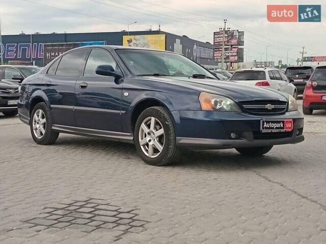 Синий Шевроле Эванда, объемом двигателя 2 л и пробегом 301 тыс. км за 4540 $, фото 2 на Automoto.ua