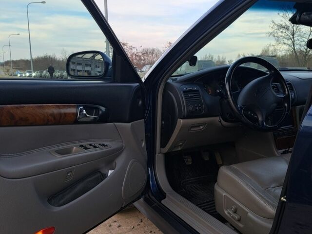 Синий Шевроле Эванда, объемом двигателя 2 л и пробегом 297 тыс. км за 4799 $, фото 4 на Automoto.ua