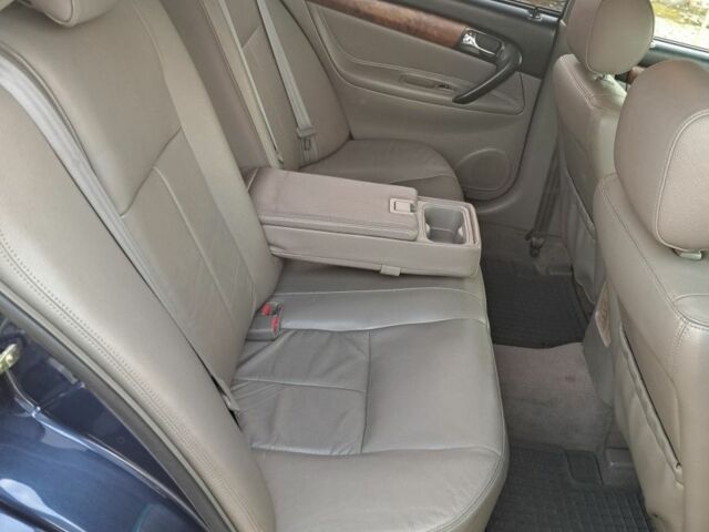 Синий Шевроле Эванда, объемом двигателя 2 л и пробегом 297 тыс. км за 4799 $, фото 3 на Automoto.ua