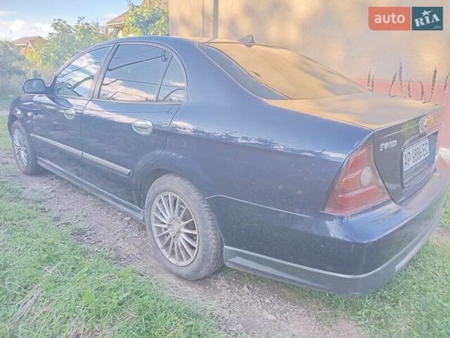 Синій Шевроле Еванда, об'ємом двигуна 2 л та пробігом 244 тис. км за 1900 $, фото 16 на Automoto.ua