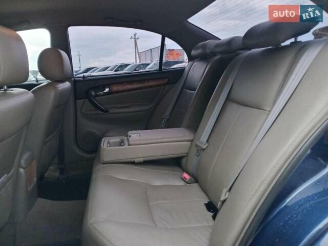 Синий Шевроле Эванда, объемом двигателя 2 л и пробегом 301 тыс. км за 4540 $, фото 23 на Automoto.ua