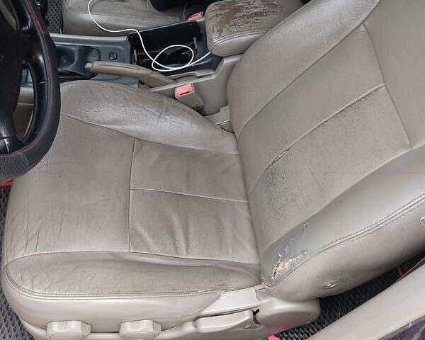 Синий Шевроле Эванда, объемом двигателя 2 л и пробегом 190 тыс. км за 3700 $, фото 4 на Automoto.ua