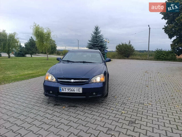 Синій Шевроле Еванда, об'ємом двигуна 2 л та пробігом 400 тис. км за 3300 $, фото 1 на Automoto.ua