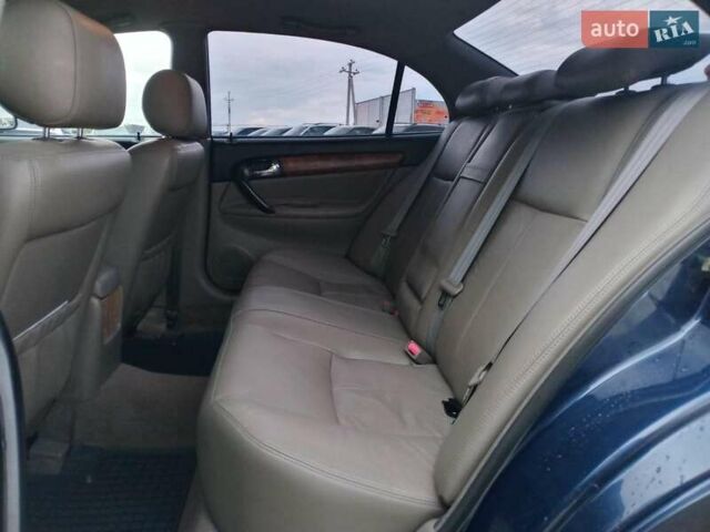 Синий Шевроле Эванда, объемом двигателя 2 л и пробегом 301 тыс. км за 4540 $, фото 24 на Automoto.ua