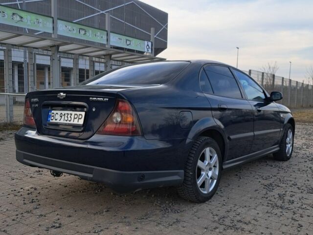 Синий Шевроле Эванда, объемом двигателя 2 л и пробегом 297 тыс. км за 4799 $, фото 1 на Automoto.ua