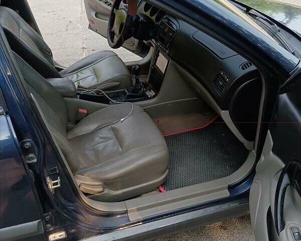 Синий Шевроле Эванда, объемом двигателя 2 л и пробегом 190 тыс. км за 3700 $, фото 10 на Automoto.ua