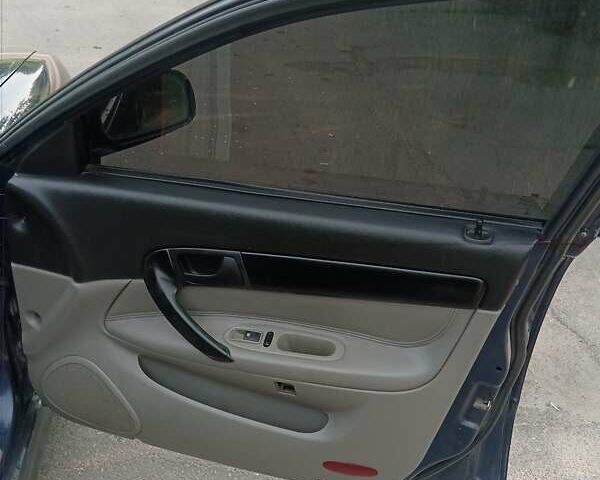 Синий Шевроле Эванда, объемом двигателя 2 л и пробегом 190 тыс. км за 3700 $, фото 11 на Automoto.ua