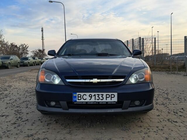 Синий Шевроле Эванда, объемом двигателя 2 л и пробегом 297 тыс. км за 4799 $, фото 6 на Automoto.ua