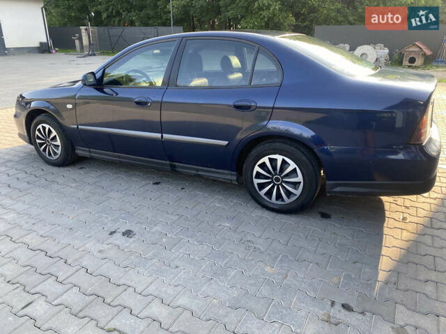 Синий Шевроле Эванда, объемом двигателя 2 л и пробегом 450 тыс. км за 2799 $, фото 4 на Automoto.ua