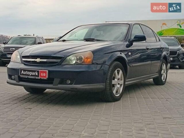 Синий Шевроле Эванда, объемом двигателя 2 л и пробегом 301 тыс. км за 4540 $, фото 39 на Automoto.ua