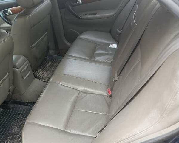 Синий Шевроле Эванда, объемом двигателя 2 л и пробегом 270 тыс. км за 2499 $, фото 12 на Automoto.ua