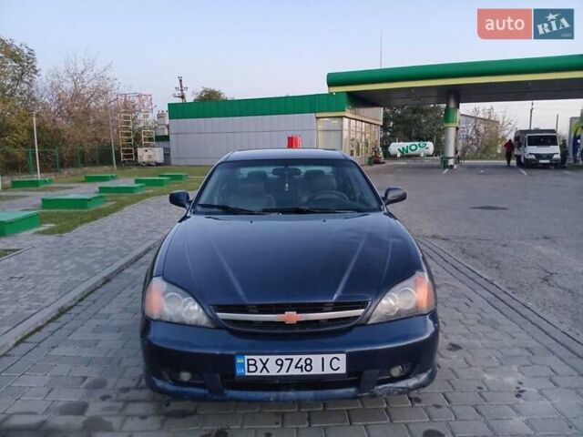 Синий Шевроле Эванда, объемом двигателя 2 л и пробегом 265 тыс. км за 3000 $, фото 5 на Automoto.ua