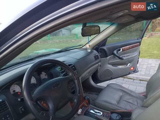 Синий Шевроле Эванда, объемом двигателя 2 л и пробегом 265 тыс. км за 3000 $, фото 1 на Automoto.ua