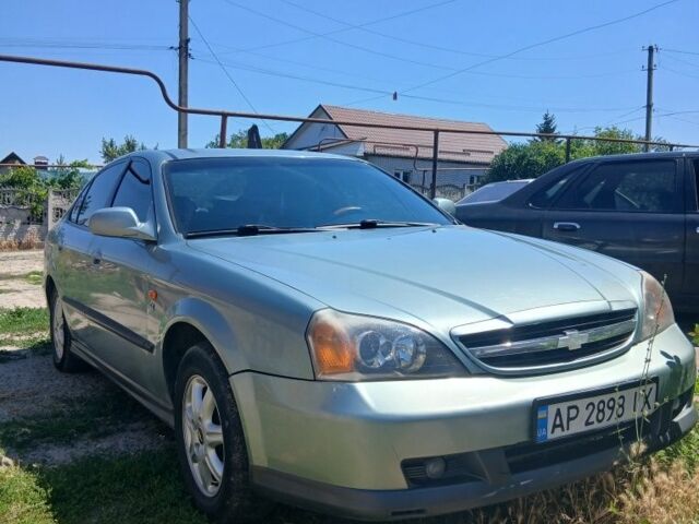 Зелений Шевроле Еванда, об'ємом двигуна 2 л та пробігом 330 тис. км за 3600 $, фото 7 на Automoto.ua